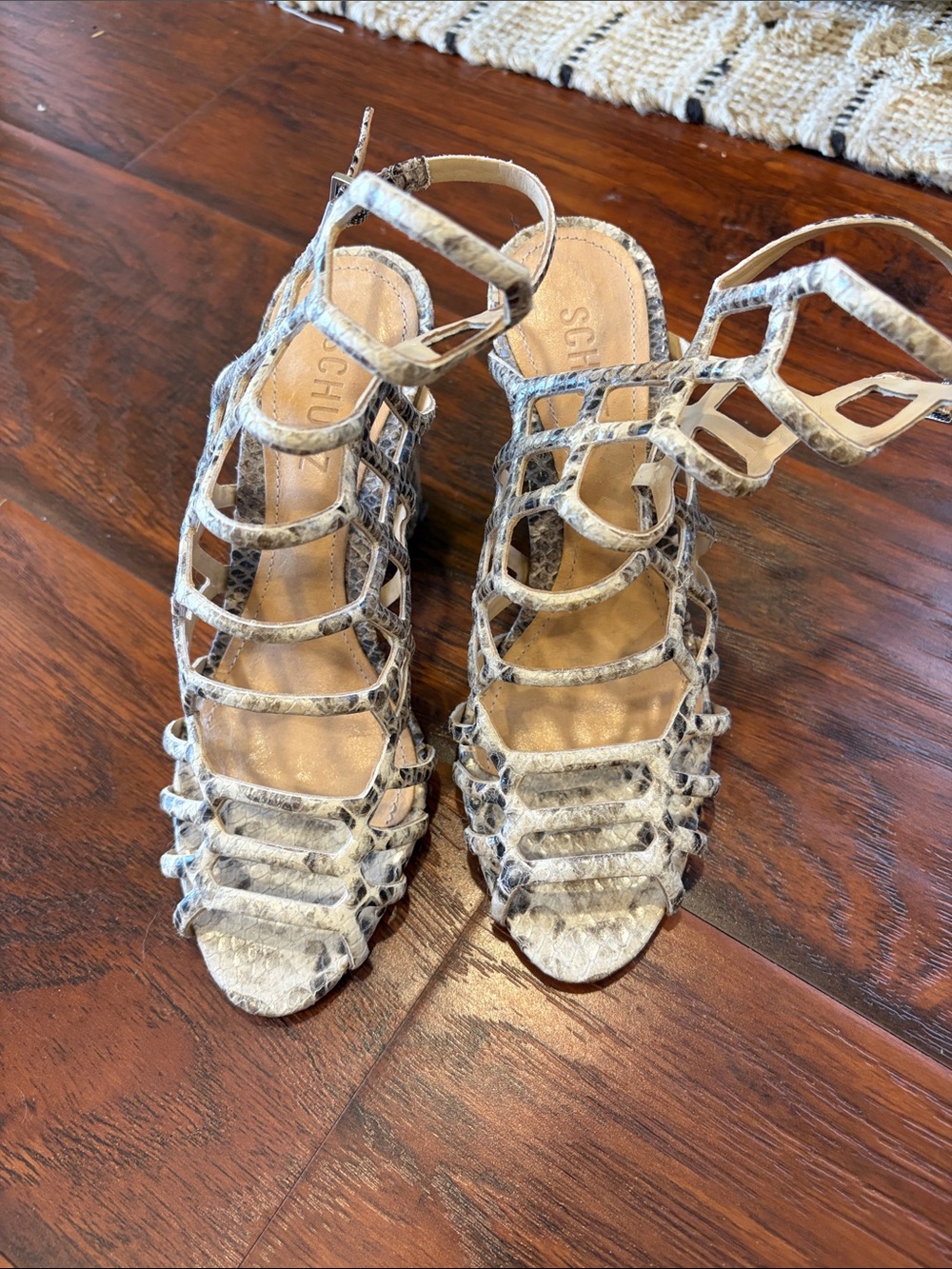 SCHUTZ Snake-Print Cage Sandals in Cream and Gray